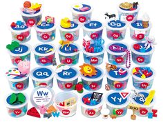 the plastic cups are filled with letters and numbers