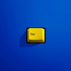 an esc button on a blue background