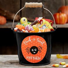 a trick or treat bucket filled with candy