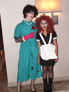 two people dressed in costumes standing next to each other