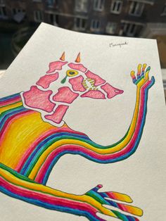 a piece of paper with a drawing of a unicorn on it