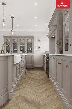 an image of a kitchen setting with wood flooring