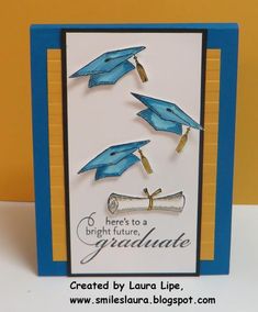 congratulations card with blue graduation caps and tassels