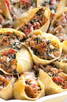 stuffed shells filled with meat and sauce in a casserole dish, ready to be eaten