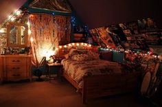 a bed room with a neatly made bed and lots of lights