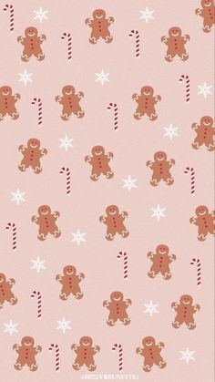 a pink background with gingerbreads and candy canes