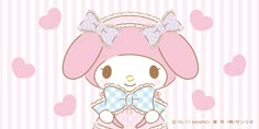 a cute little bunny holding a heart shaped object in her hands with hearts on the background