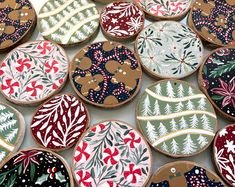 some decorated cookies are sitting on a table