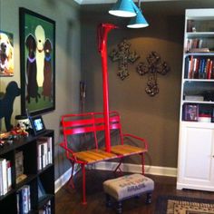 a living room filled with furniture and bookshelves