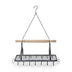 a metal rack with a wooden handle hanging from it's side and hooks attached to the