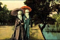 two people standing next to each other under umbrellas in the rain near a pond