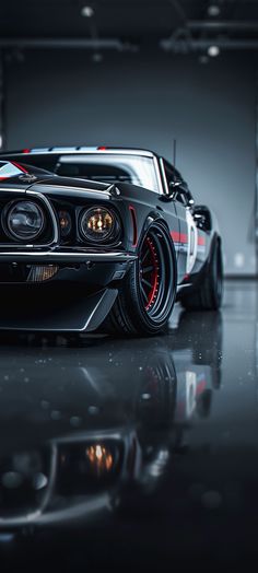 a black sports car parked in a garage