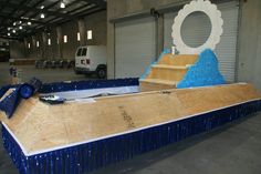 an unfinished skateboard ramp in a garage