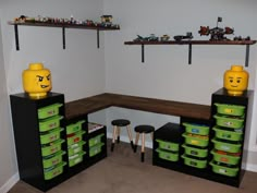 a room filled with lots of green containers and legos on top of shelves next to each other