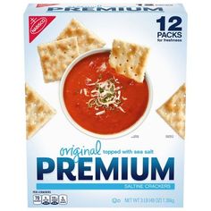 a box of crackers with tomato soup and cheese