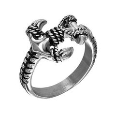 A refined braiding detail illuminates the anchor design of this two-tone stainless steel ring. Metal: Two-tone stainless steelDimensions: 3.5mm shank width; 1.5mm shank thicknessGallery Height: 25mmJewelry photos are enlarged to show detail. Anchor Ring, Anchor Rings, Rings Bands, Anchor Design, The Anchor, Ring Ideas, Stainless Steel Ring, Ring Color, Ring Metal