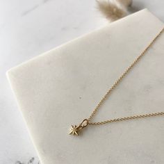 These little North Star pendants are an ideal for layering, or perfect as a minimal everyday necklace.  Pair with other pieces from the celestial collection such as Luna, Crescent Moon and Sunbeam.  Details: W 7mm x L 7mm 14k Gold Vermeil Pendant 14k Gold Fill Chain Choice of Chain Style and Length  Presented in Lovebird Gift Box Minimalist Star Of David Necklace For Everyday, Dainty Star Charm Necklace For Everyday, Minimalist Everyday Jewelry With Star Charm, Everyday Delicate Star Charm Necklaces, Minimalist Star Charm Necklace As Gift, Delicate Star Charm Necklace For Everyday, Everyday Yellow Gold Necklace With Star Charm, Minimalist Star Charm Necklace, Everyday Yellow Gold Charm Necklace With Star