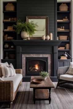 a living room filled with furniture and a fire place in front of a book shelf