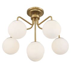 three light brass ceiling fixture with white glass balls