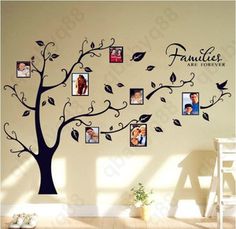 the family tree wall decal is decorated with photos