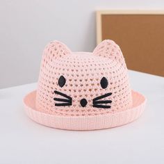 Keep Your Baby Cool and Adorable This Summer! Protect your little one from the sun's harsh rays with our Summer Baby Straw Hat featuring Cute Cat Ears. Designed for infants and toddlers aged 6 to 24 months, this charming bucket hat is perfect for beach days, park outings, or any outdoor adventure. Made from a blend of polyester and cotton, it offers a comfortable, breathable fit, ensuring your baby stays cool and stylish. Product Features Material: Polyester and cotton blend Head Circumference: Cute Beach Hats With Uv Protection, Playful Hats With Uv Protection, Cute Summer Hats For Playtime, Playful Sun Hat With Uv Protection, Playful Uv Protection Hats, Cute Beach Hat With Uv Protection, Playful Hats With Uv Protection For Playtime, Playful Pink One Size Fits Most Sun Hat, Playful Adjustable Crochet Hat For Vacation