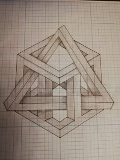 a pencil drawing of a geometric design on paper