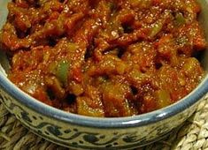 a close up of a bowl of food on a table