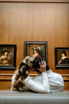 Couple sits cuddled up in the couch in an art museum Cute Engagement Photos, Couple Engagement Pictures, Universal Language, Engagement Photo Poses, Engagement Poses, Couple Photoshoot Poses