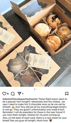 two boxes of baked goods sitting on top of a counter next to an open box