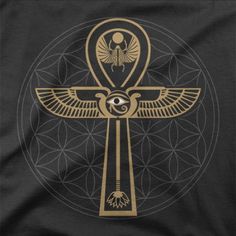 an egyptian cross with the word ark written in gold on a black t - shirt