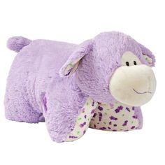 a purple stuffed animal with spots on it's face and neck, laying down