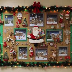 a bulletin board decorated with christmas pictures and decorations