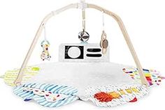 a baby's play mat with a camera on it