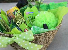 a basket filled with lots of green items