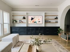 the living room is clean and ready for guests to use it as an entertainment center