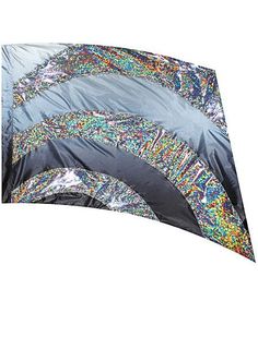 an upside down umbrella with many different colors and designs on it's side,