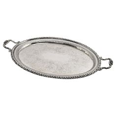 an ornate silver tray with handles and beading on the rim, set against a white background