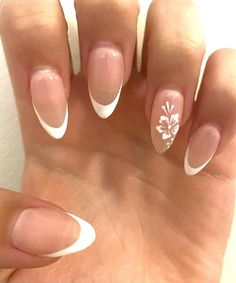 Flower On One Nail Design, Classy White Nails Short, Almond Nail With Flower Design, White French Tips With Flowers On Ring Finger, Nails White Design Classy, White Almond Nails With Flower Design, Clear Nail Base Designs, Summer Nails White Flowers, Almond French Tip Summer Nails