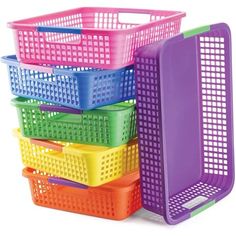 colorful plastic baskets stacked on top of each other