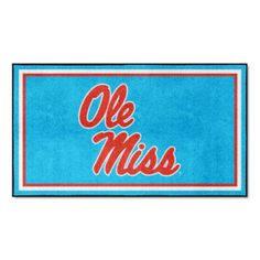 a blue door mat with the word olee miss in red and white on it