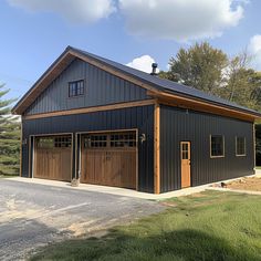 a two car garage with an attached carport