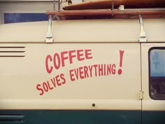 an old van with the words coffee solves everything written on it