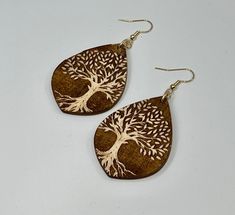 Meaningful Jewelry - Unique and Stunning! Reminiscent of simpler days, curl up under your favorite shade with these beautiful Woodland Earrings also known as Tree of Life that have been engraved and cut from maple wood and prepared by me. The trees have a 3D raised effect.  This listing is for ONE pair in natural unpainted color way as show in first picture. The perfect gift for yourself, someone you love, co-worker or earth / nature lover. Each set of earrings will come beautifully packaged for Woodland Tree, Woodland Earrings, Laser Engraved Ideas, Nickel Free Jewelry, Tree Earrings, Earth Nature, Meaningful Jewelry, Earring Tree, Engraved Wood