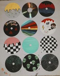 various stickers on a piece of paper that has been cut out to look like donuts