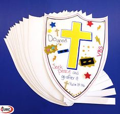 a bunch of white paper with a cross on it