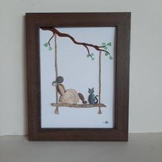 a painting of two cats sitting on a tree branch with a cat in the swing