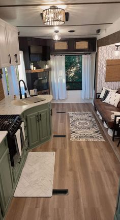 the kitchen is clean and ready to be used as a living room or dining area