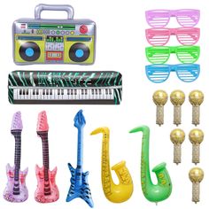 various toy musical instruments and glasses are shown in this image, including an electric keyboard