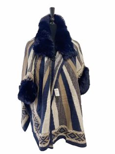 Oversized Winter Cape For Cold Weather, Winter Sweater Coat For Cold Weather, One Size Cape For Cold Weather, Cozy Outerwear For Cold Weather One Size, Cozy One-size Outerwear For Cold Weather, Warm One-size-fits-all Winter Outerwear, Cozy Winter Cape Poncho, Faux Fur Trim Cape For Cold Weather In Fall, Fall Cape With Faux Fur Trim For Cold Weather