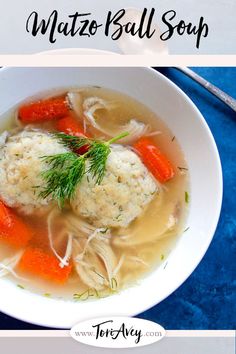 a bowl of soup with dumplings, carrots and parsley on the side